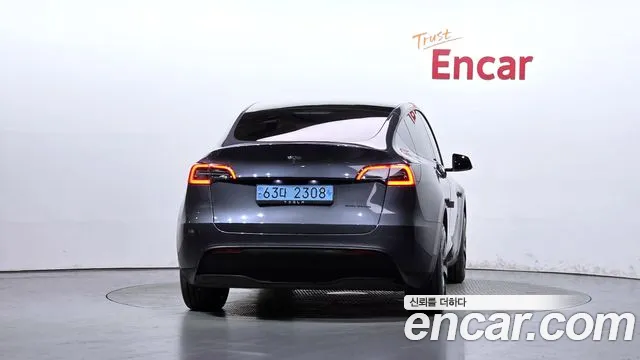 Tesla Model Y — Фото автомобиля 4