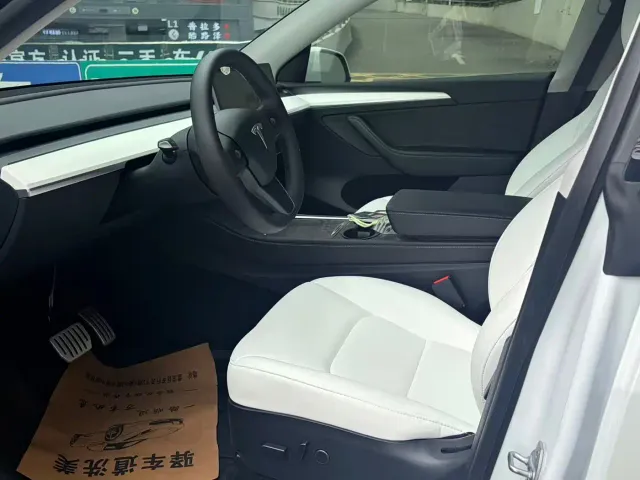 Tesla Model Y — Фото автомобиля 8