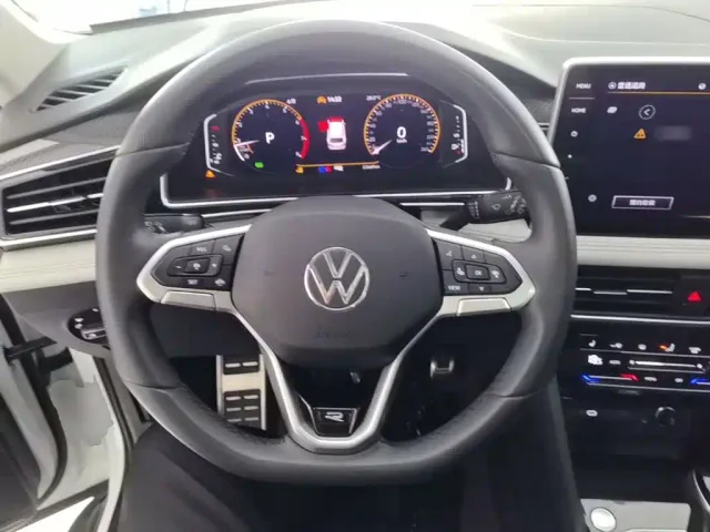Volkswagen Tiguan L — Фото автомобиля 10