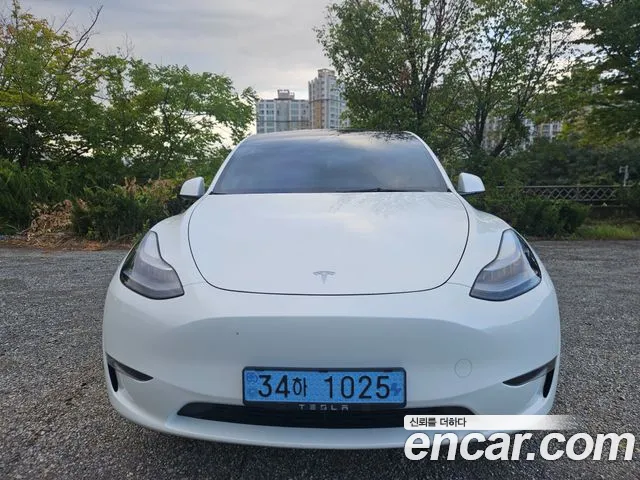 Tesla Model Y — Фото автомобиля 3