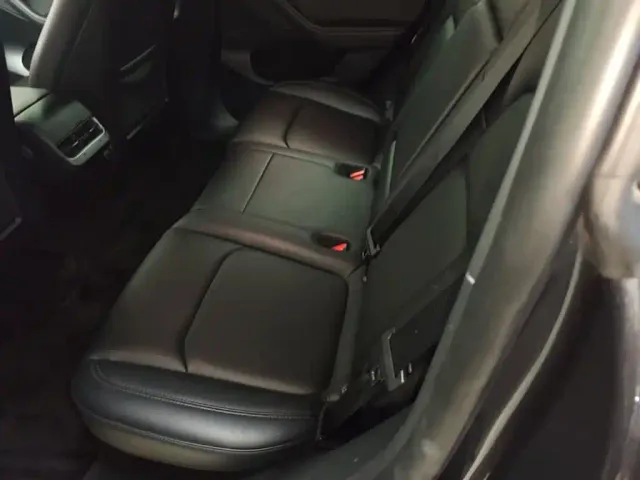 Tesla Model Y — Фото автомобиля 16