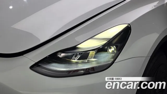 Tesla Model Y — Фото автомобиля 7
