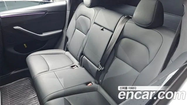 Tesla Model Y — Фото автомобиля 29