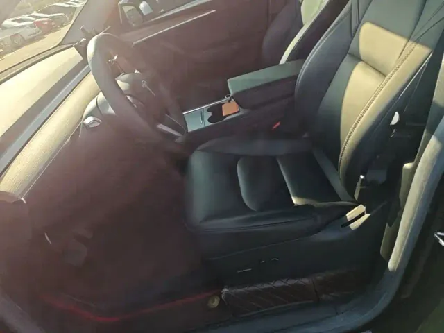 Tesla Model Y — Фото автомобиля 14
