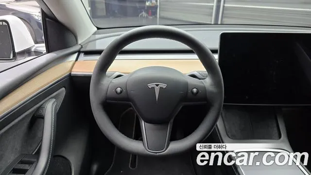 Tesla Model Y — Фото автомобиля 19