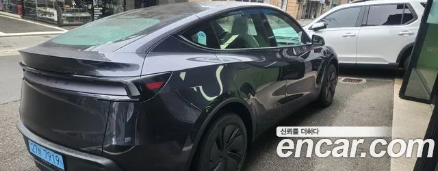 Tesla Model Y — Фото автомобиля 4