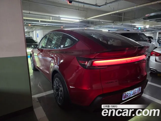 Tesla Model Y — Фото автомобиля 5