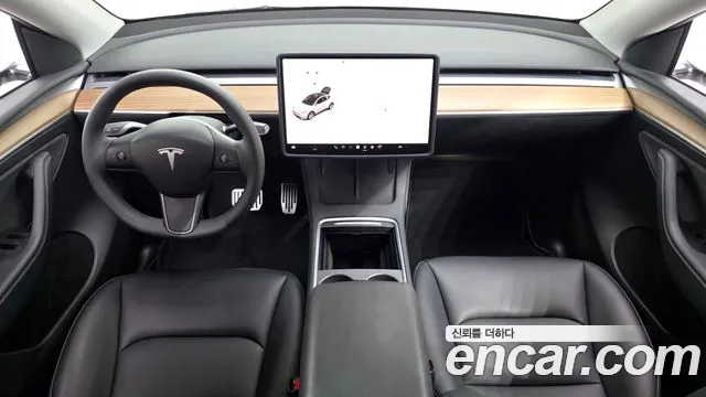 Tesla Model Y — Фото автомобиля 10