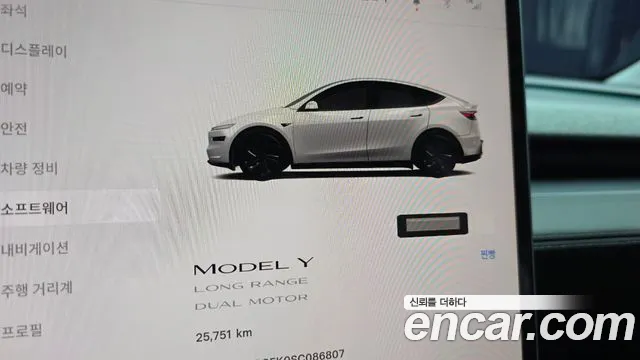 Tesla Model Y — Фото автомобиля 11