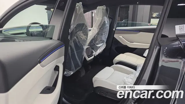 Tesla Model Y — Фото автомобиля 16