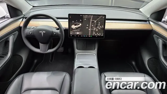 Tesla Model Y — Фото автомобиля 10