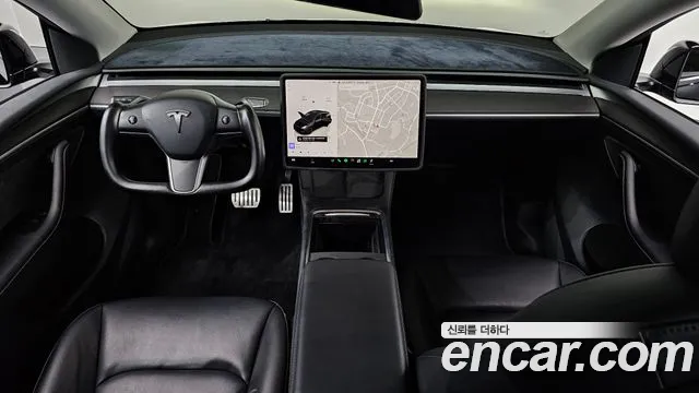 Tesla Model Y — Фото автомобиля 10