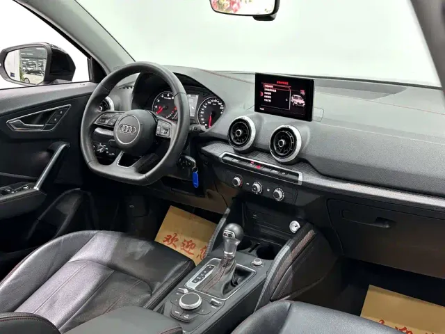 Audi Q2L — Фото автомобиля 11