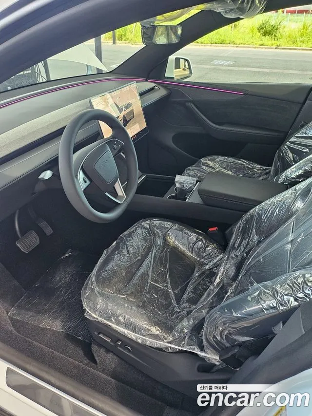 Tesla Model Y — Фото автомобиля 15