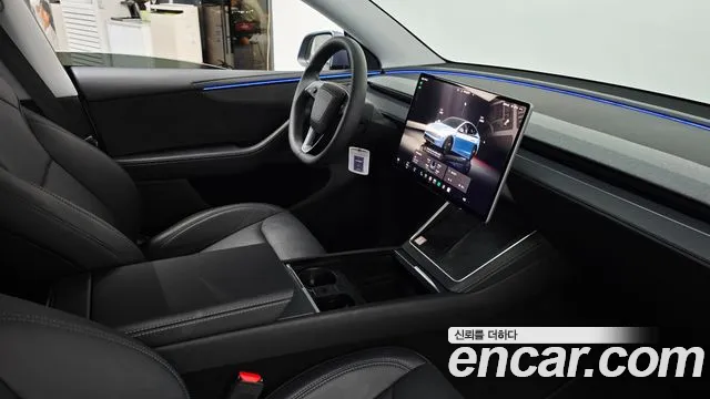 Tesla Model Y — Фото автомобиля 18