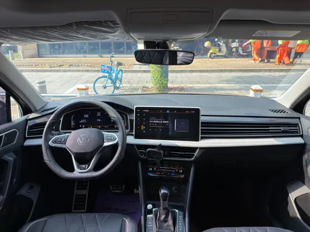 Volkswagen Tiguan L — Фото автомобиля 4