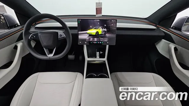 Tesla Model Y — Фото автомобиля 10