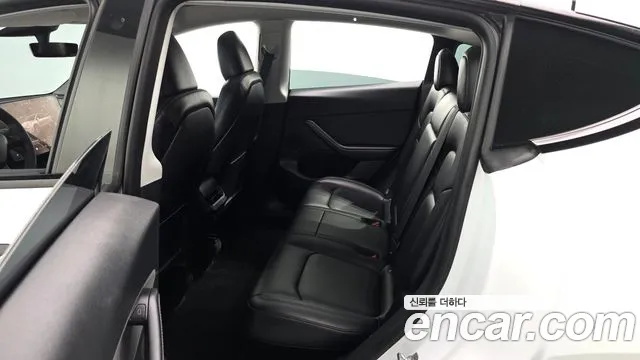 Tesla Model Y — Фото автомобиля 18