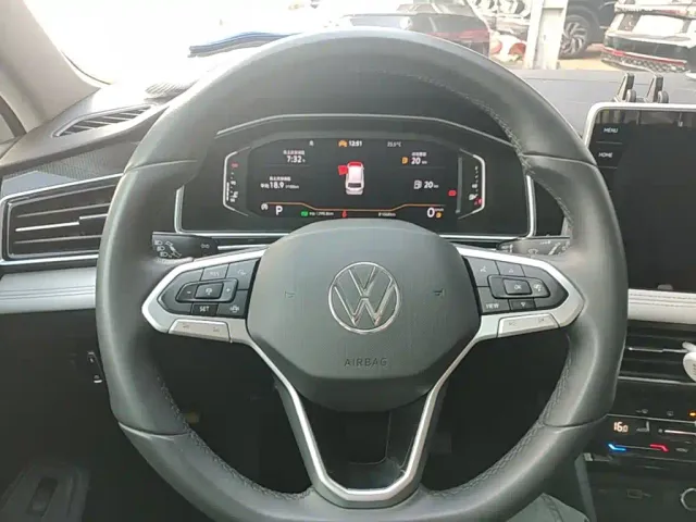 Volkswagen Tiguan L — Фото автомобиля 10