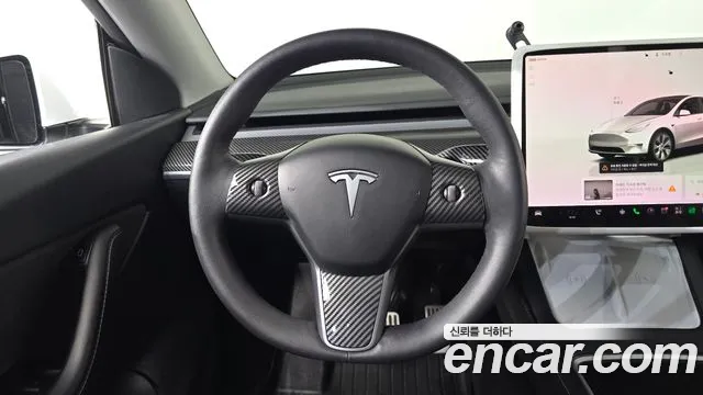 Tesla Model Y — Фото автомобиля 13