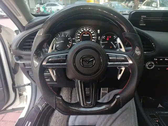 Mazda Axela — Фото автомобиля 10