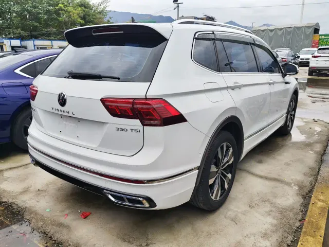 Volkswagen Tiguan L — Фото автомобиля 5