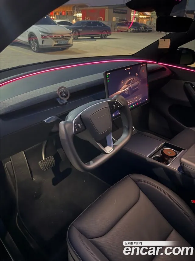 Tesla Model Y — Фото автомобиля 13