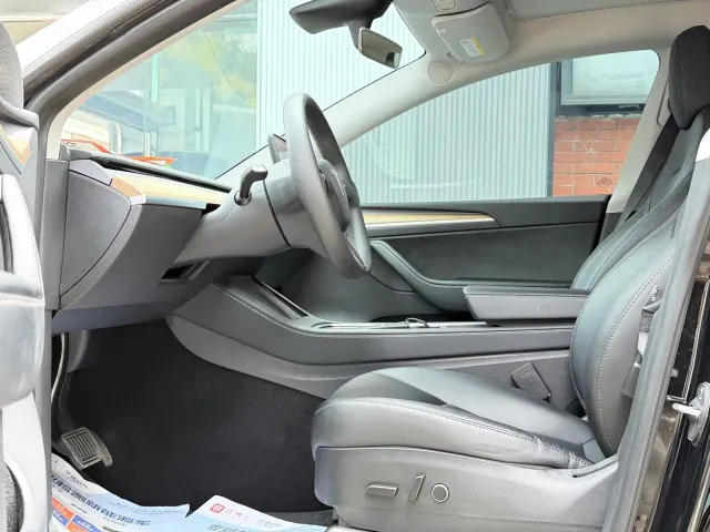 Tesla Model Y — Фото автомобиля 10