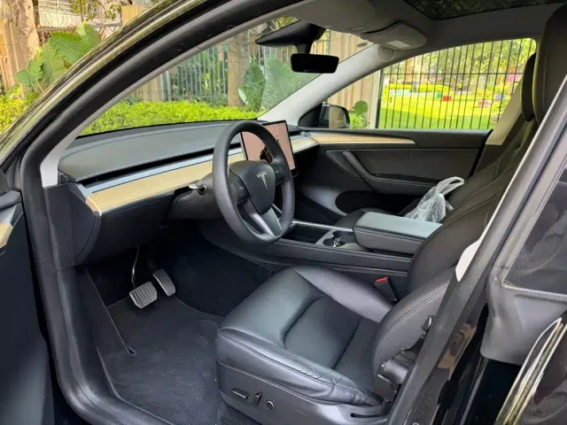 Tesla Model Y — Фото автомобиля 7