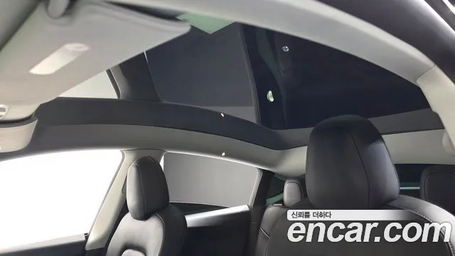 Tesla Model Y — Фото автомобиля 22