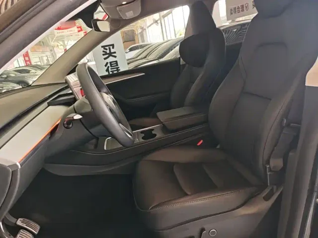 Tesla Model Y — Фото автомобиля 14