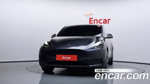 Tesla Model Y — Фото автомобиля 3