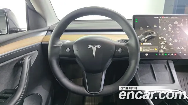Tesla Model Y — Фото автомобиля 13