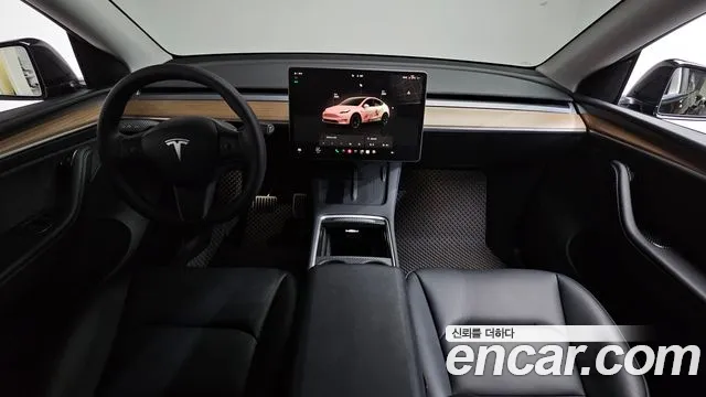 Tesla Model Y — Фото автомобиля 7