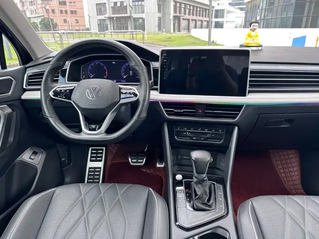 Volkswagen Tiguan L — Фото автомобиля 9