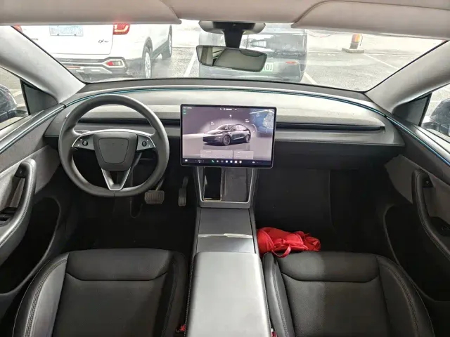 Tesla Model Y — Фото автомобиля 9
