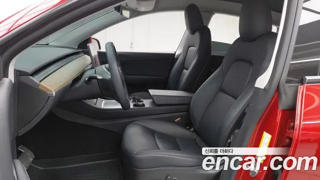 Tesla Model Y — Фото автомобиля 12