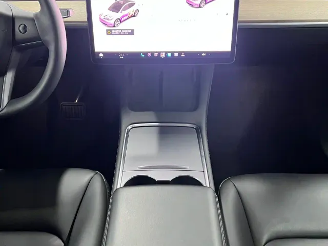 Tesla Model Y — Фото автомобиля 12