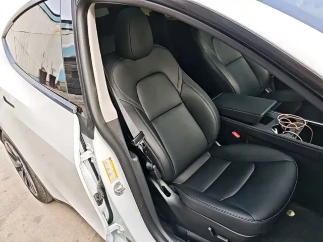Tesla Model Y — Фото автомобиля 24