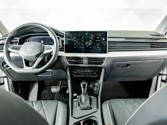Volkswagen Tiguan L — Фото автомобиля 12
