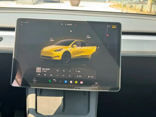 Tesla Model Y — Фото автомобиля 11