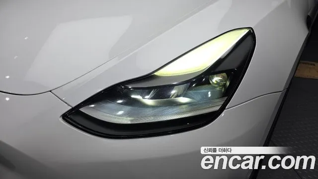 Tesla Model Y — Фото автомобиля 22