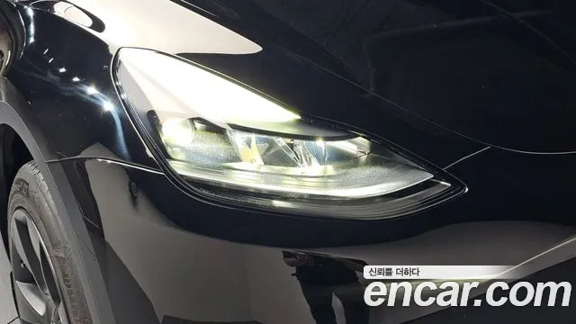 Tesla Model Y — Фото автомобиля 7