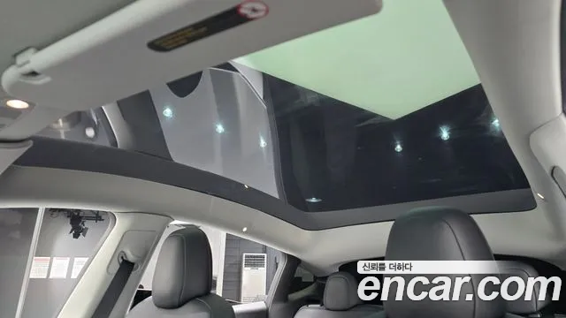 Tesla Model Y — Фото автомобиля 23