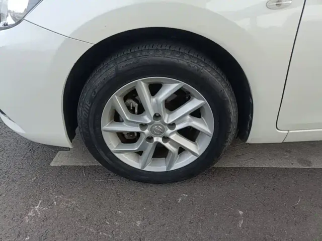 Nissan Tiida — Фото автомобиля 22