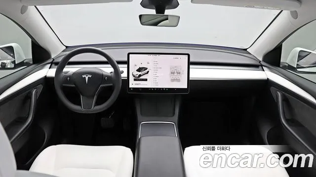 Tesla Model Y — Фото автомобиля 7