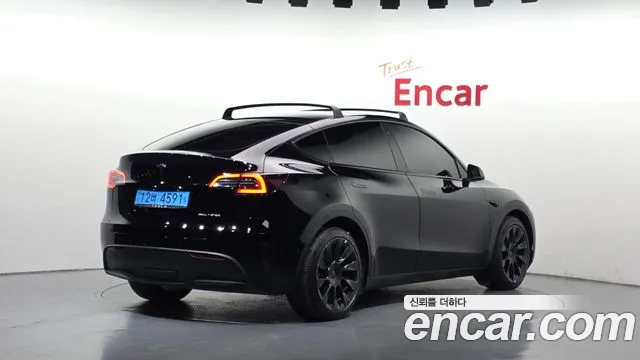 Tesla Model Y — Фото автомобиля 2