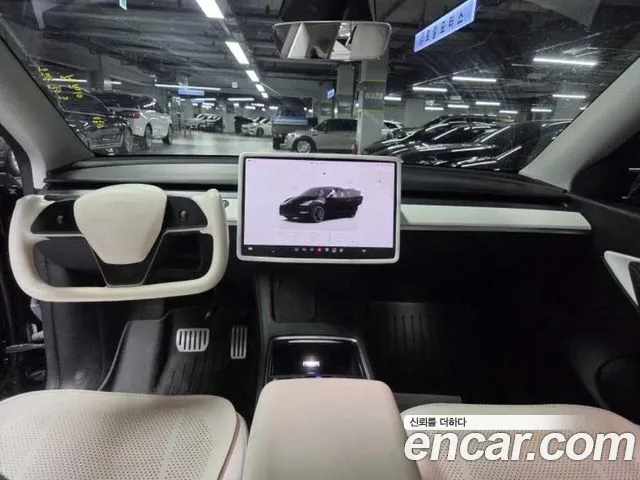 Tesla Model Y — Фото автомобиля 7