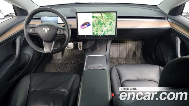 Tesla Model 3 — Фото автомобиля 6