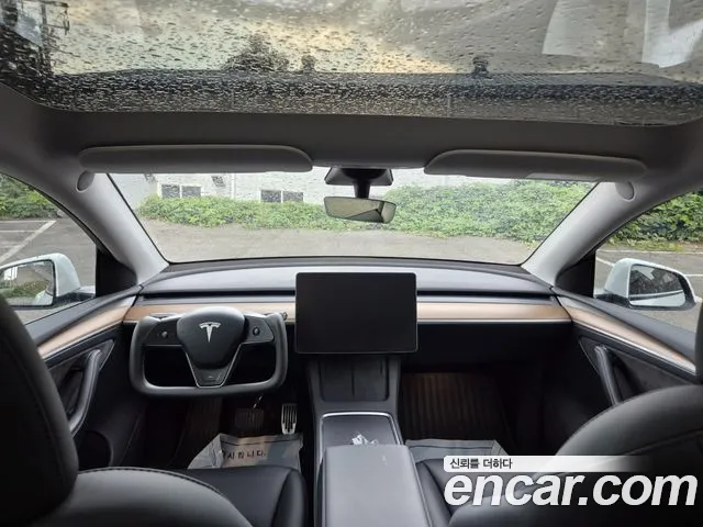 Tesla Model Y — Фото автомобиля 7